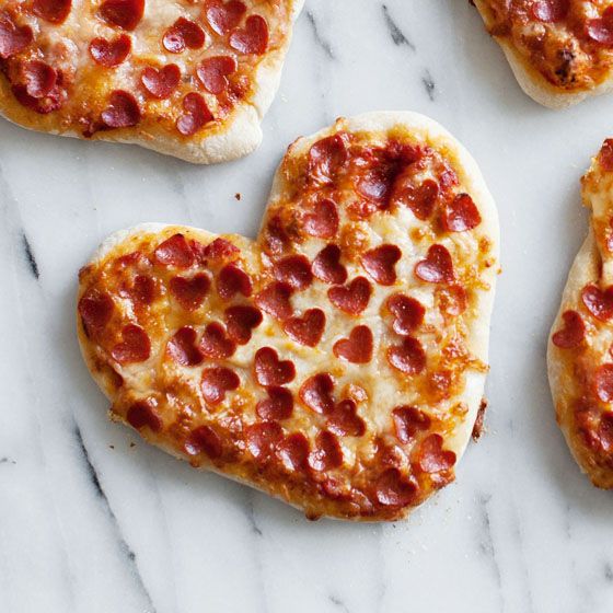heart shaped pizza showing how restaurants are helping communities