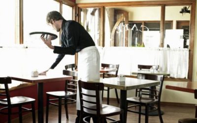 Waiter Setting Table To Before Opening